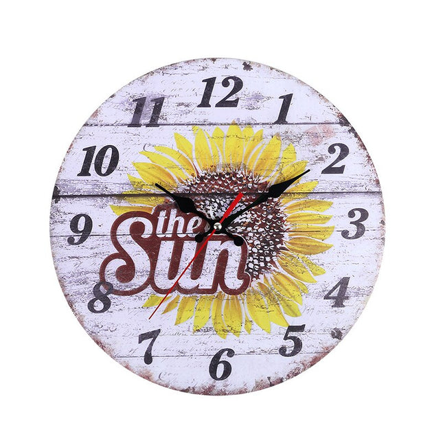 Reloj de pared redondo con girasol