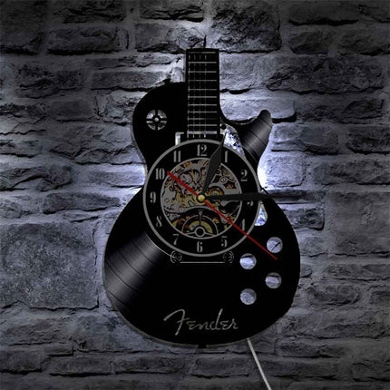 Reloj de vinilo con forma guitarra