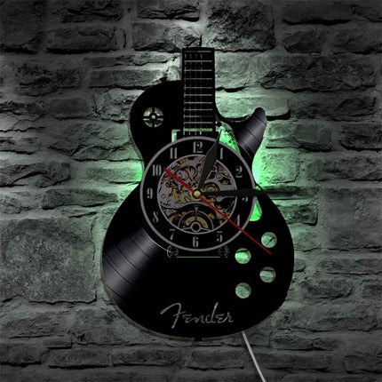 Reloj de vinilo con forma guitarra