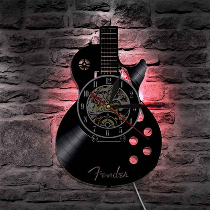 Reloj de vinilo con forma guitarra