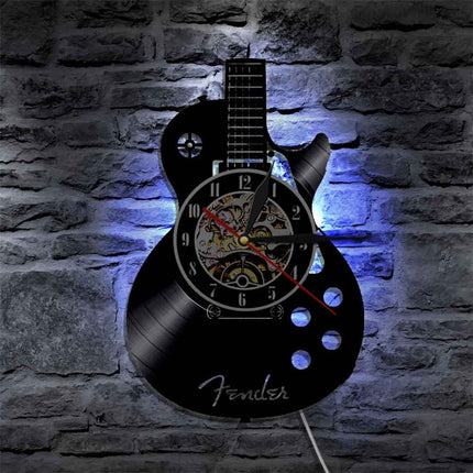 Reloj de vinilo con forma guitarra