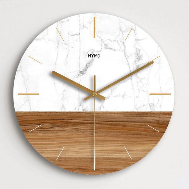 Reloj de pared mármol y oro rosa