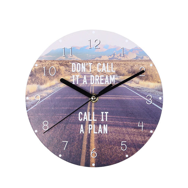 Reloj de pared de madera con frase