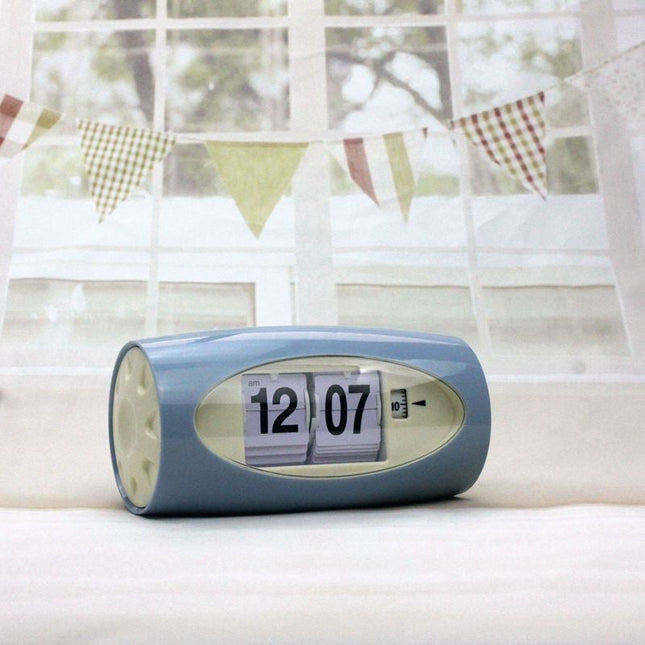 Pequeño reloj despertador flip retro