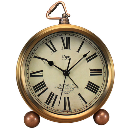 Reloj de mesa vintage retro dorado