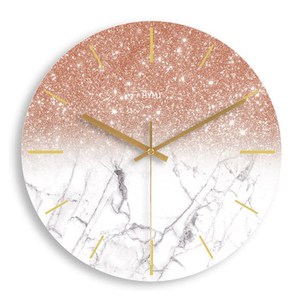 Reloj de pared mármol y oro rosa