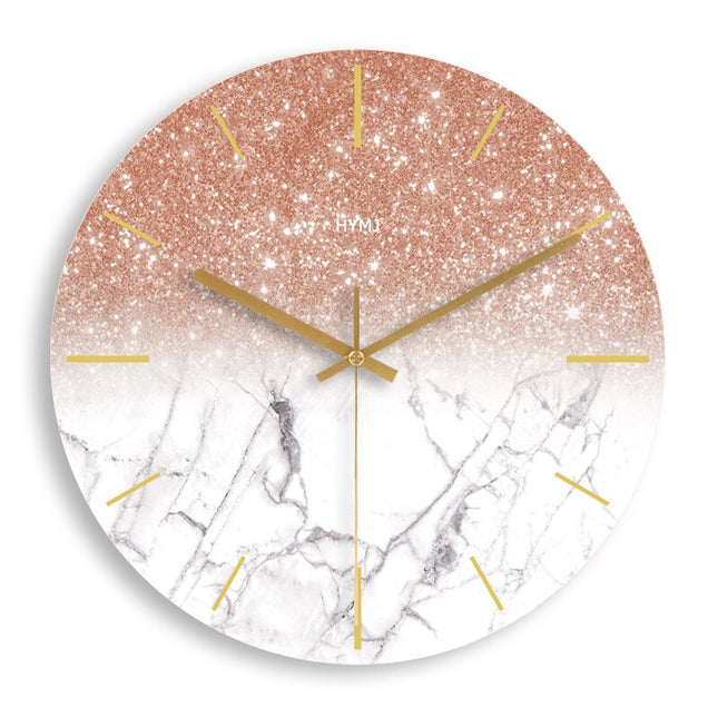 Reloj de pared mármol y oro rosa