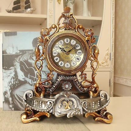 Reloj de sobremesa vintage antiguo dorado