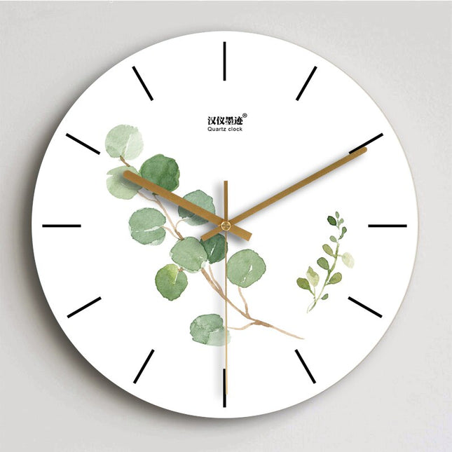 Reloj de pared mármol y oro rosa