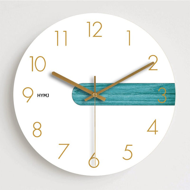Reloj de pared mármol y oro rosa