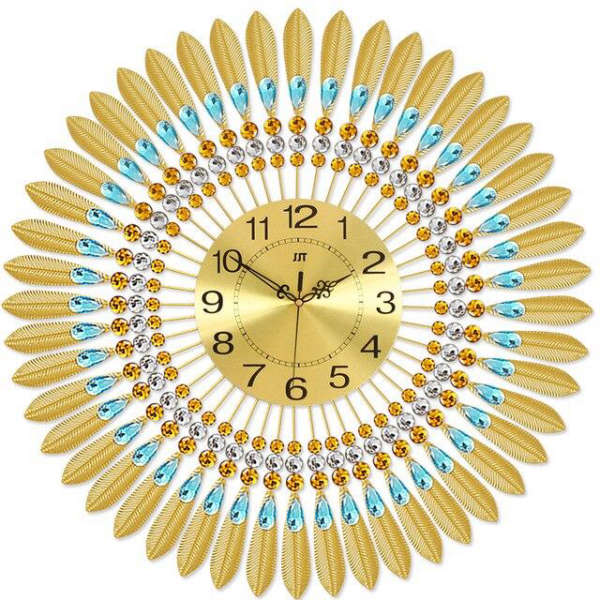Reloj de pared dorado diseño sol