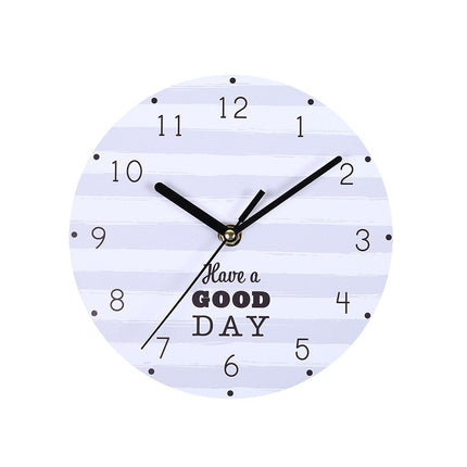 Reloj de pared de madera con frase
