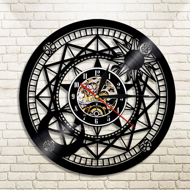 Reloj de vinilo rosa de vientos