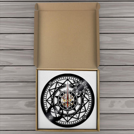 Reloj de vinilo rosa de vientos