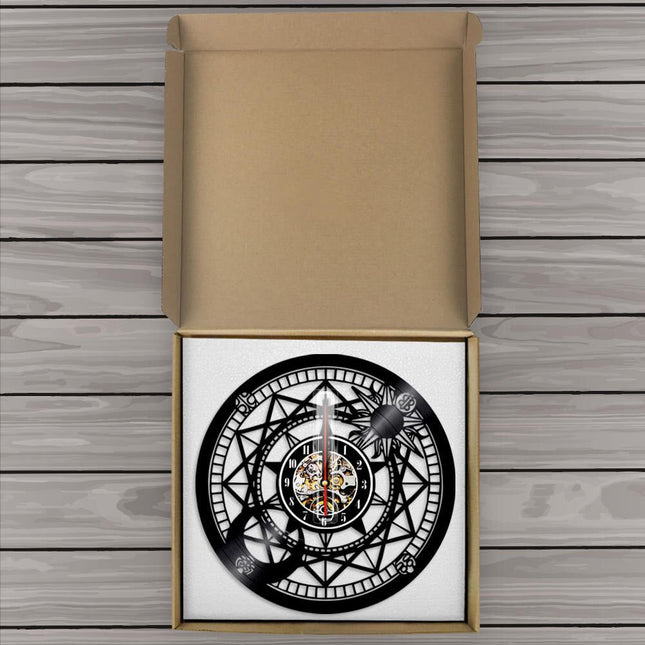 Reloj de vinilo rosa de vientos