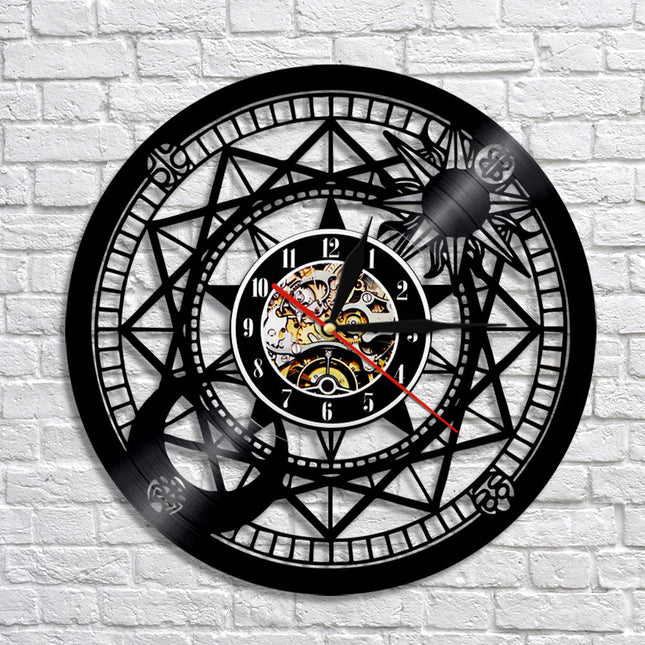 Reloj de vinilo rosa de vientos