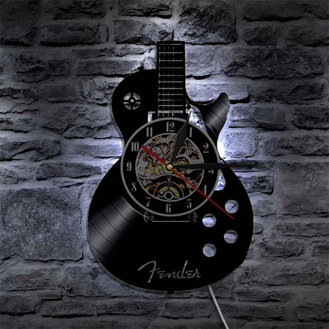 Reloj de vinilo con forma guitarra
