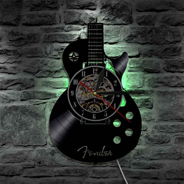 Reloj de vinilo con forma guitarra