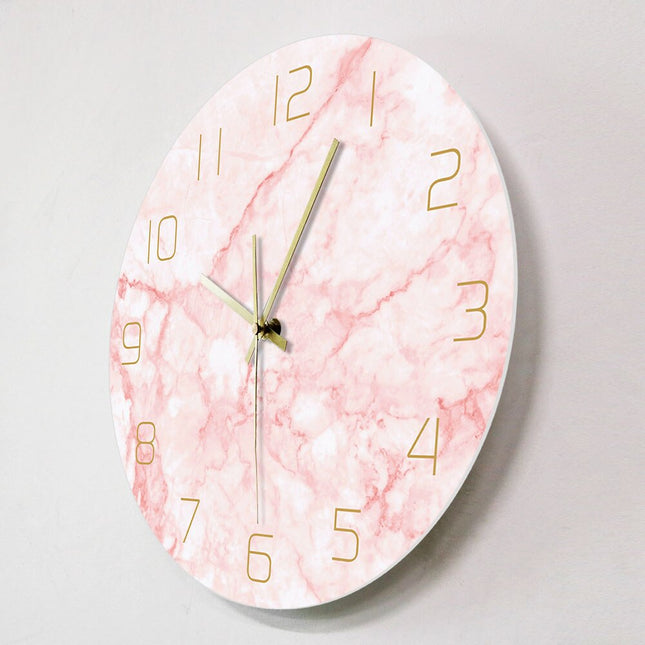Reloj de pared rosa efecto mármol