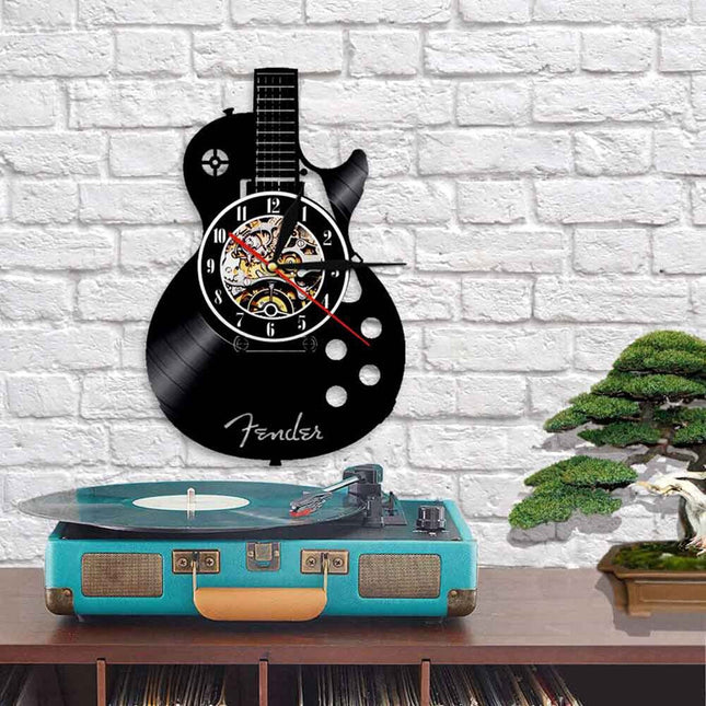 Reloj de vinilo con forma guitarra