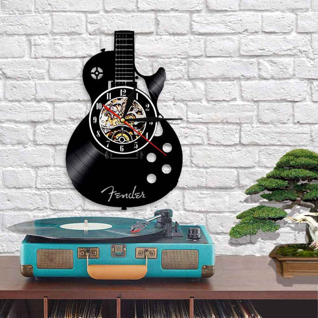Reloj de vinilo con forma guitarra