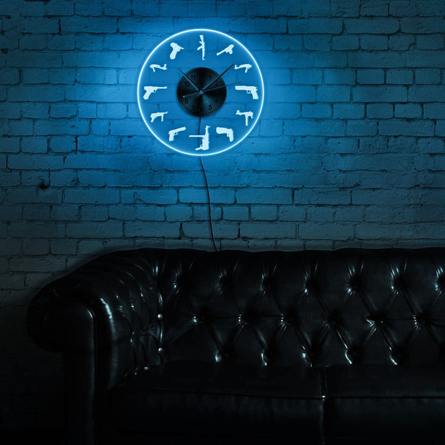 Reloj de pared LED con pistolas