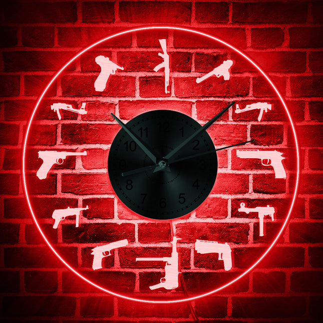 Reloj de pared LED con pistolas