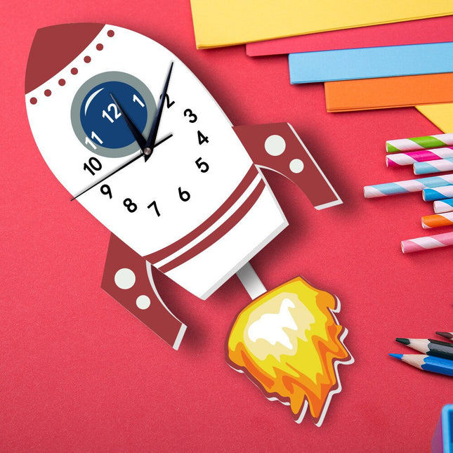 Reloj de pared infantil con péndulo cohete