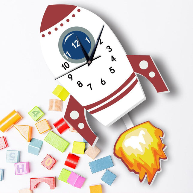 Reloj de pared infantil con péndulo cohete