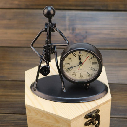 Reloj de mesa de hierro músico