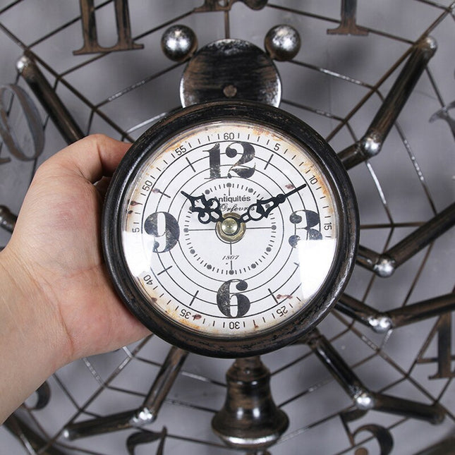 Reloj de pared industrial araña metálico