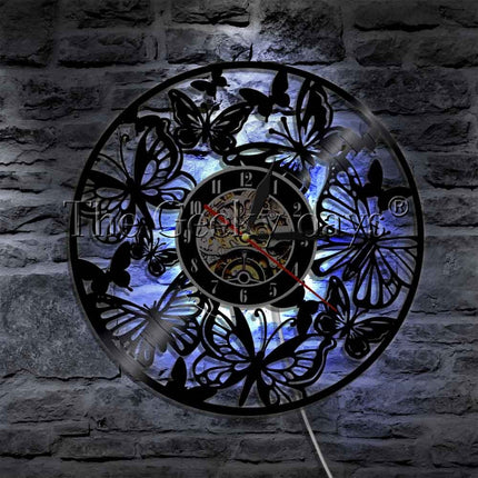 Reloj de vinilo decorativo con mariposas