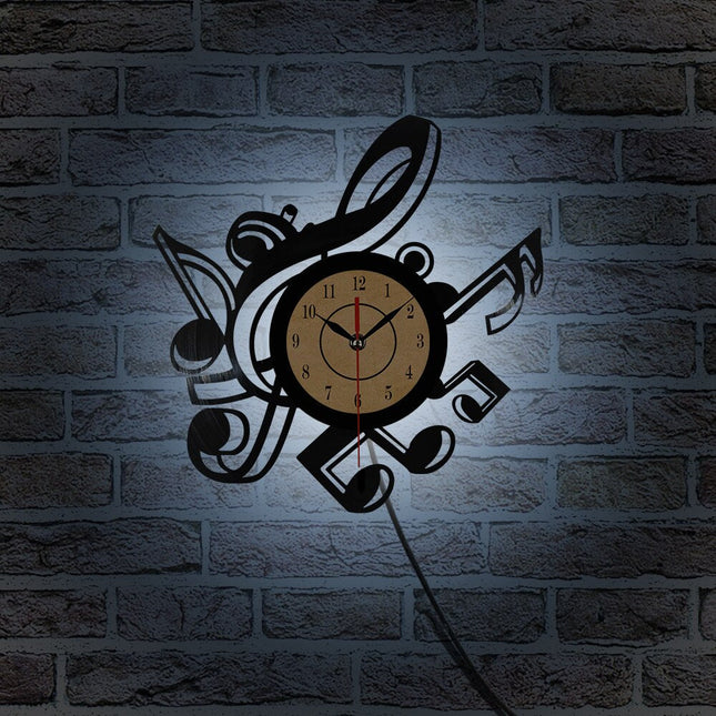 Reloj de vinilo con notas musicales