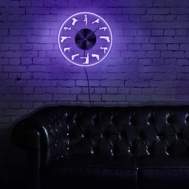 Reloj de pared LED con pistolas