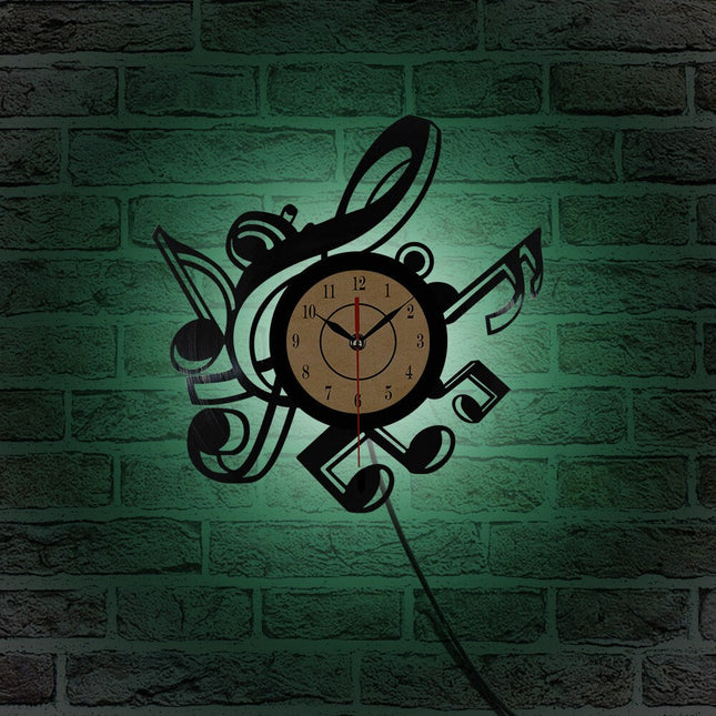 Reloj de vinilo con notas musicales