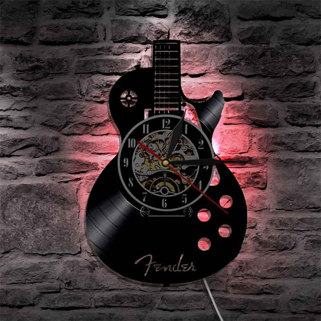 Reloj de vinilo con forma guitarra