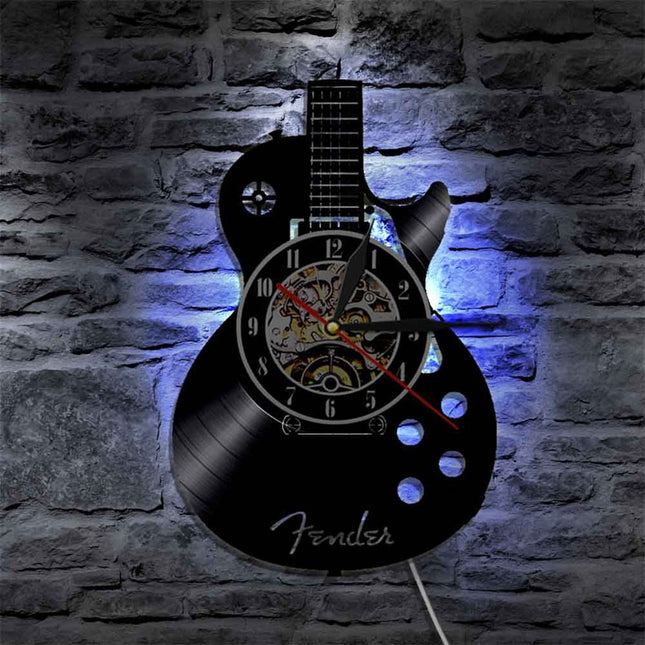 Reloj de vinilo con forma guitarra