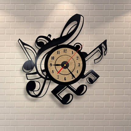 Reloj de vinilo con notas musicales