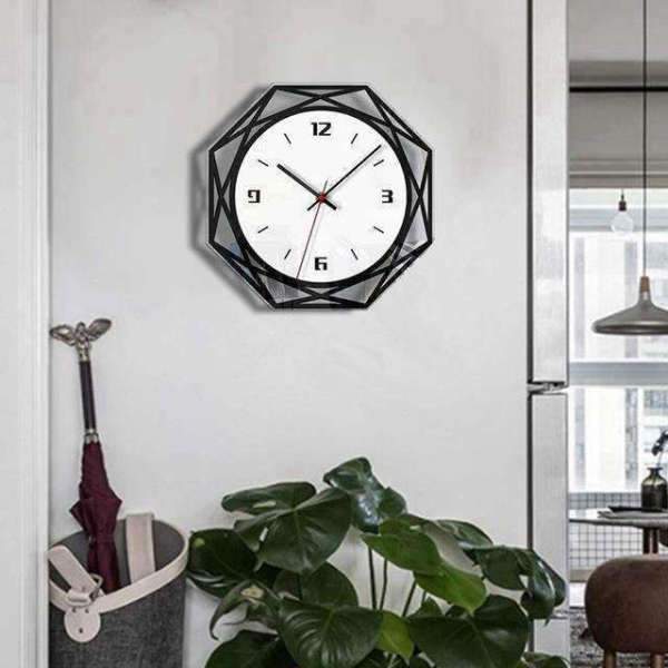 Reloj de pared geométrico blanco y negro
