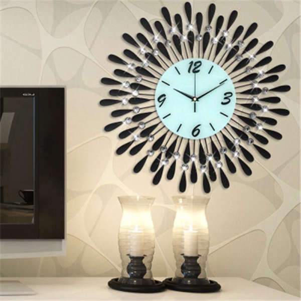 Reloj de pared grande diseño plumas