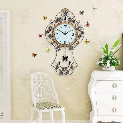 Reloj de pared vintage con mariposas