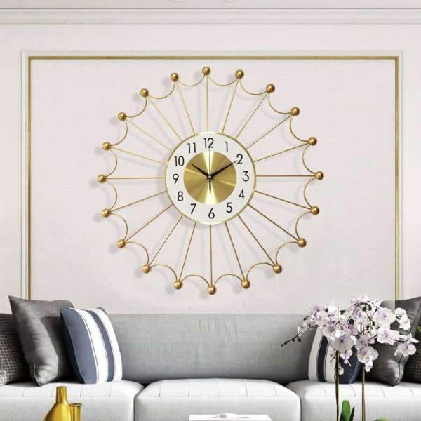 Reloj de pared grande diseño sol dorado
