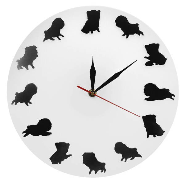 Reloj de pared con siluetas de perritos
