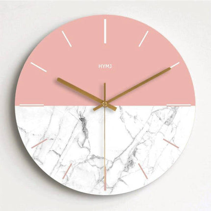 Reloj de pared mármol y oro rosa