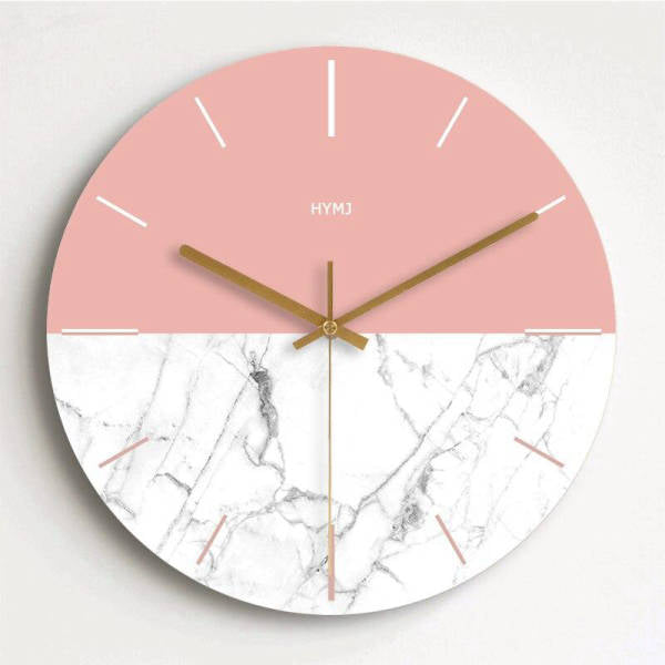 Reloj de pared mármol y oro rosa